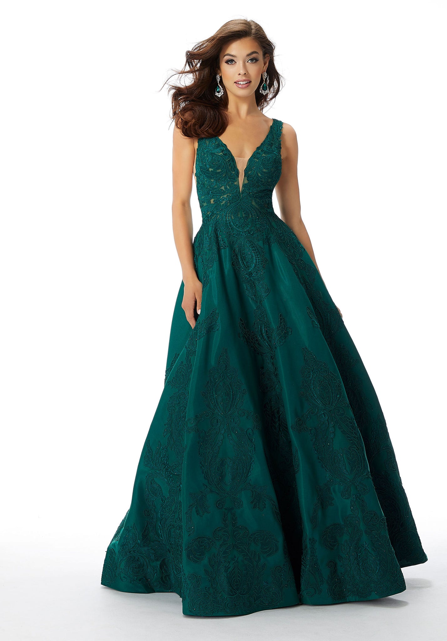 Elegant A-line gown with v-neckline, allover beaded lace appliqués and hidden pockets on Larissa satin.   Sizes: 0-28  Available in Emerald, Navy, Red, Royal, Champagne  If we do not have your desired size or color in stock please call or email us for availability