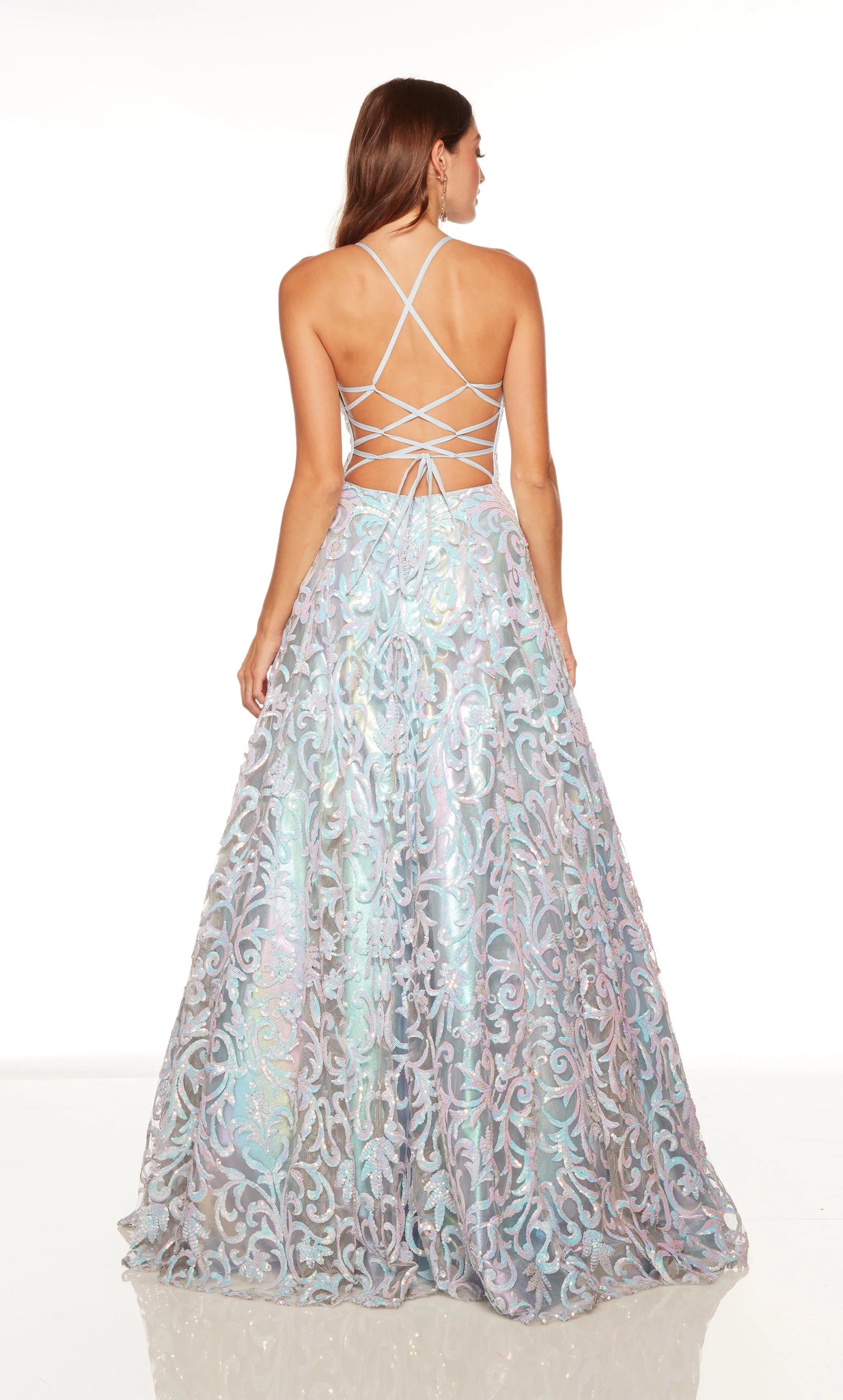 Look like a modern day princess at prom in this stunning long Alyce Paris long dress 61291 embellished with shimmering sequins throughout. This glamorous gown showcases a fitted V neckline bodice with illusion insert, spaghetti straps and open lace up tie back. The long a line skirt flows beautifully to the floor.