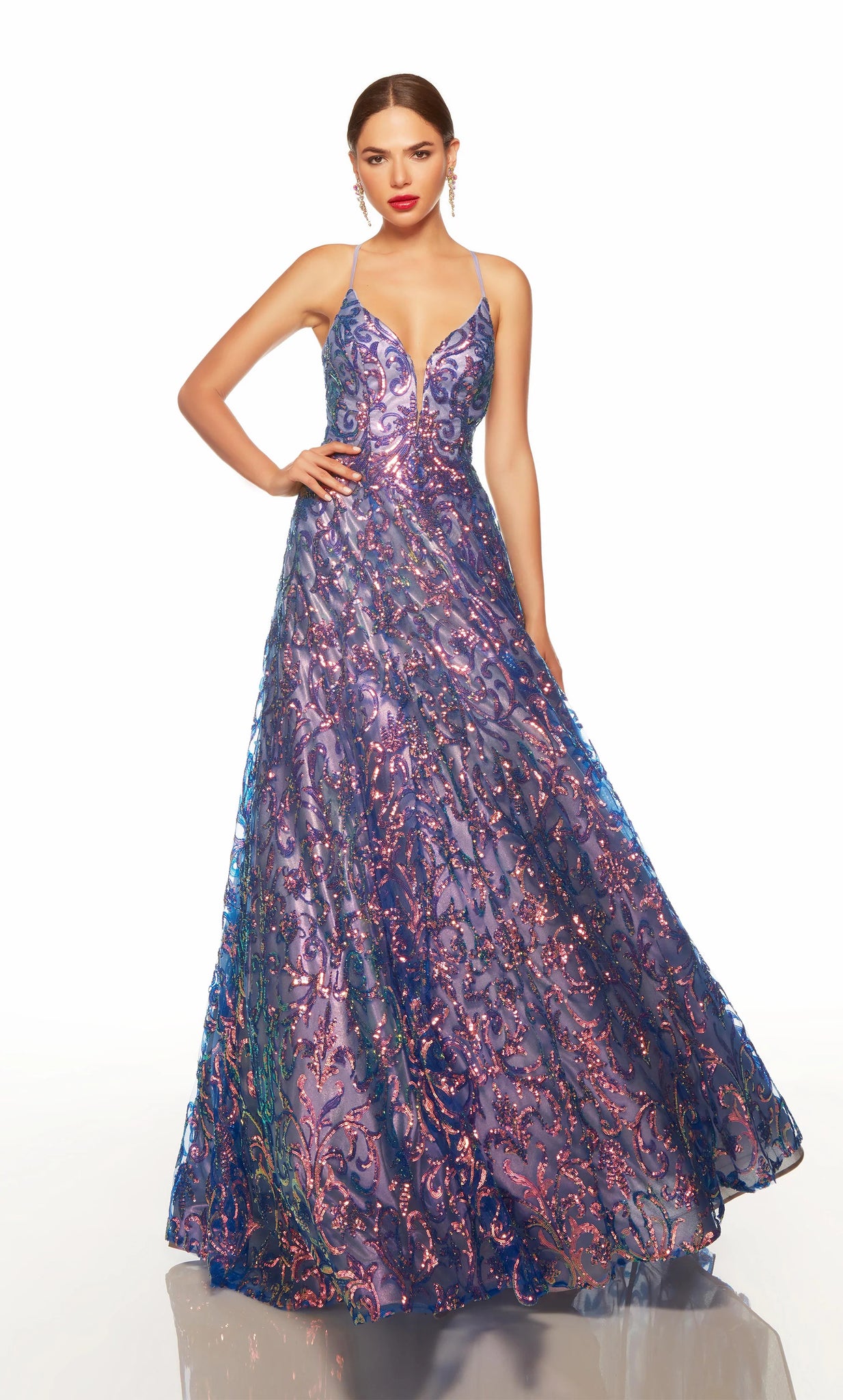 Look like a modern day princess at prom in this stunning long Alyce Paris long dress 61291 embellished with shimmering sequins throughout. This glamorous gown showcases a fitted V neckline bodice with illusion insert, spaghetti straps and open lace up tie back. The long a line skirt flows beautifully to the floor.