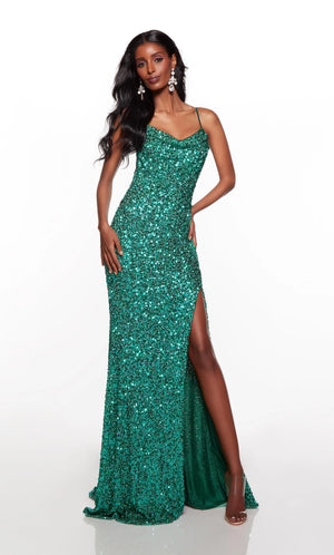 Live out your celebrity dream while wearing captivating Alyce Paris dress 61390. Gorgeous fitted dress displays a cowl neckline that matches the stunning open back cowl detail. Entirely embellished in shimmering sequins, this ravishing dress is accompanied by a high slit. Definitely a must have dress for your next event.