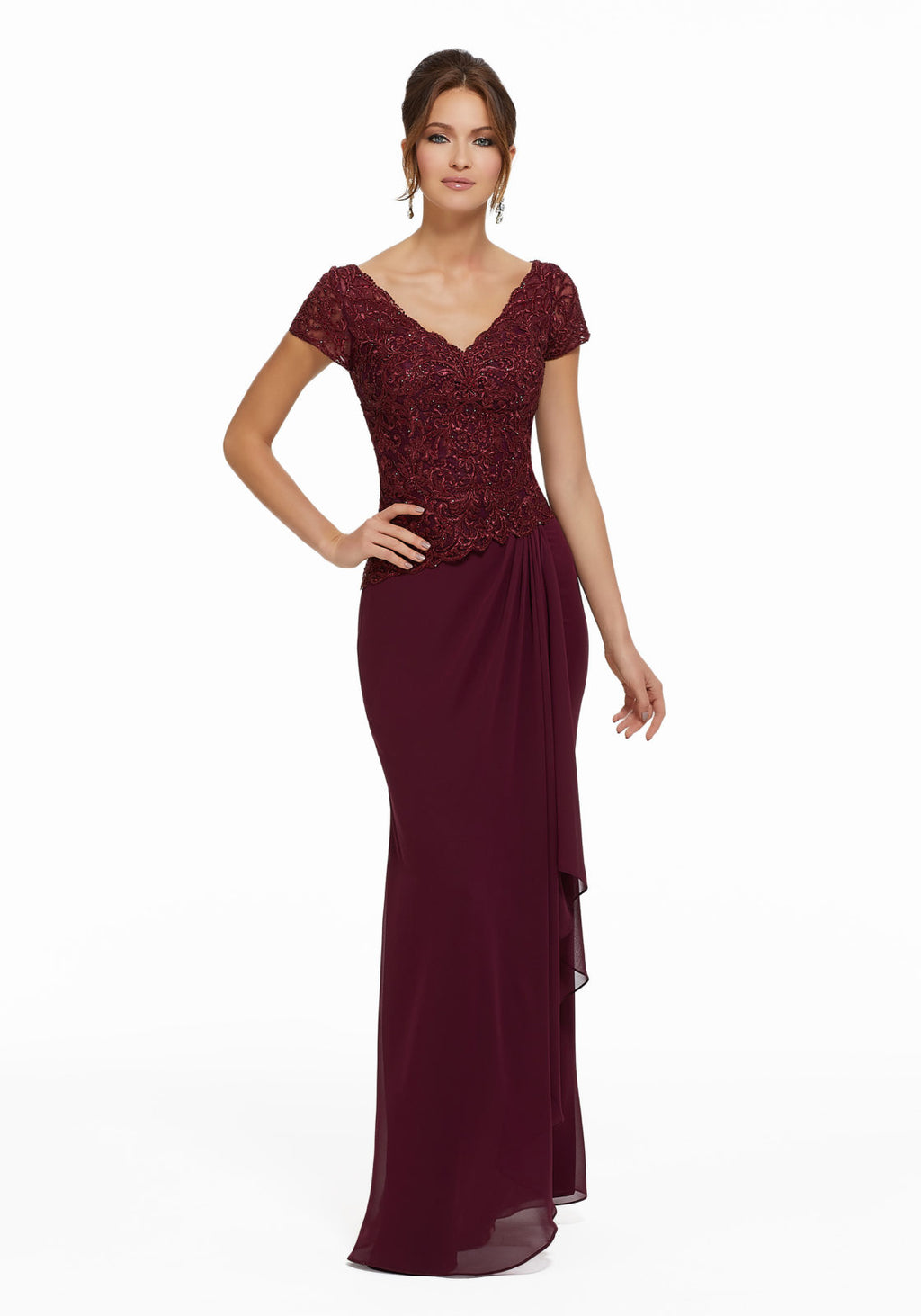 Chiffon evening gown featuring beaded lace appliques on a net bodice with short sleeves. Sheath silhouette with cascading detail on skirt.  Sizes: 2-24  Available in Wine, Navy  If we do not have your desired size or color in stock please call or email us for availability!