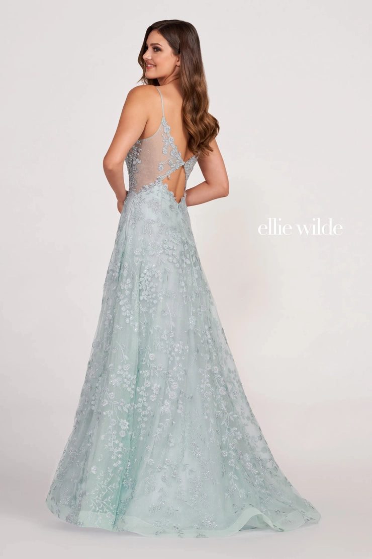 Style EW34048 from Ellie Wilde by Mon Cheri is a sweet embroidered lace with stones prom gown with an A-line silhouette, illusion back and sides, and a plunging neckline.