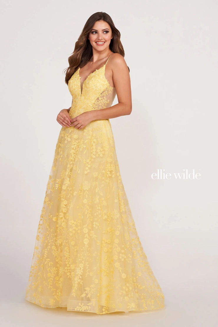 Style EW34048 from Ellie Wilde by Mon Cheri is a sweet embroidered lace with stones prom gown with an A-line silhouette, illusion back and sides, and a plunging neckline.