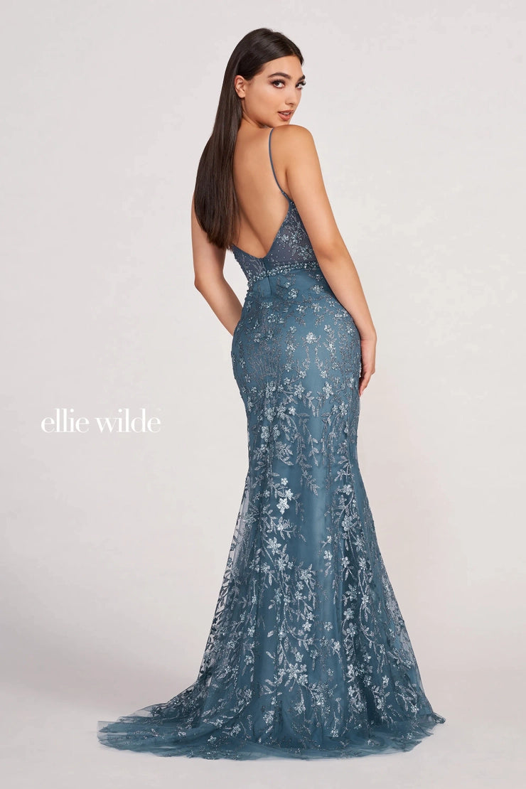 Ellie Wilde EW34058 is a gorgeous cracked ice fitted jersey dress illusion bodice and leg slit.  Comes with detachable overlay