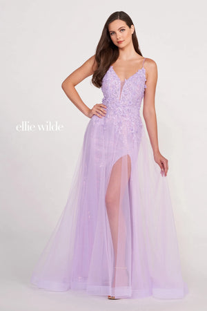 Unleash your inner princess in Ellie Wilde prom style EW34072. This stunning prom dress has a beautiful lace bodice covered in beautiful 3D floral appliques, and a V-shaped neckline ties the look together. The skirt has a sultry thigh high slit with a peek-a-boo moment behind the flowy tulle skirt. This prom dress is perfect the upcoming prom season or any other special occasion where a formal dress is needed. 
