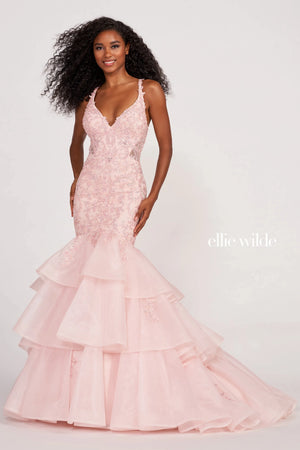 Feel untouchable in this fashionable long style EW34082 by Ellie Wilde. The dazzling dress features a v neckline paired with a hugging bodice and an illusion back fully adorned with embroidery that trickles down the fitted silhouette. Headlining the sensational three tiered ruffled tulle skirt to have all your photos Instagram worthy.