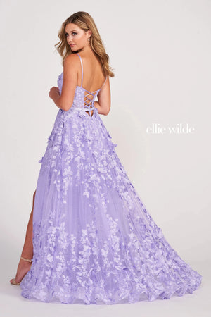This Ellie Wilde EW34109 lavender formal dress features a semi-sheer corset bodice with a shallow scoop neckline, spaghetti straps and lace-up back. This A-line prom gown is fashioned in glitter tulle with beaded embroidery and 3D flowers, jazzed up with a thigh-high slit and a beaded belt. This trendy look is completed with side pockets, horsehair hem and sweep train.