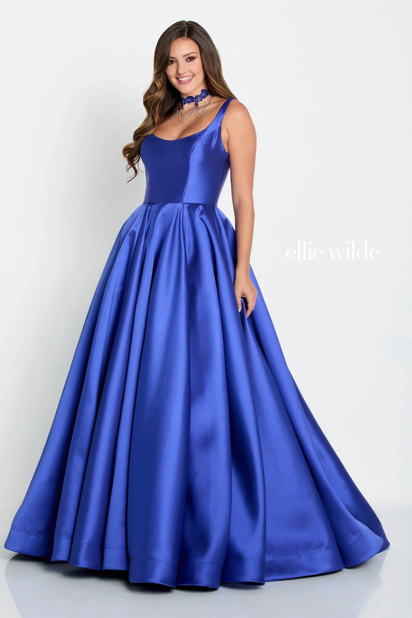 Less is more, specially with this staggering long dress EW34130 by Ellie Wilde. Elegant a line dress displays a scoop neckline with thick straps for extra support. Featuring essential pockets, this amazing dress is perfect for any and every special event. The sweep train that follows behind is the perfect finishing touch to this classy gown.