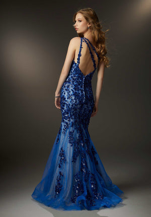 Pretty mermaid prom dress sparkles with crystal beaded, patterned sequins accented by delicate embroidery on glitter tulle for the extra pop of bling. The one-shoulder neckline is totally chic and leads to a cool strappy back.